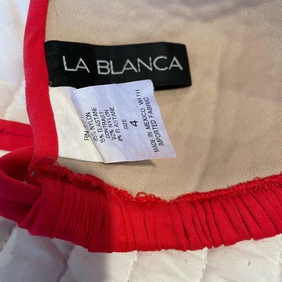 Two piece bathing suit.  Bottom is a skort - Picture 4 of 6